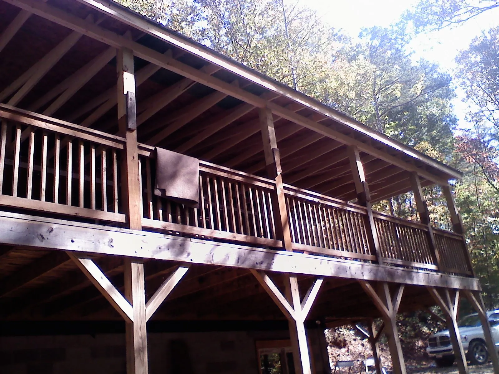 Timber framing under a new elevated porch and deck — Roof Leak Repair in Morgan Hill by Roofing Brothers